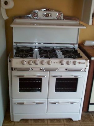 1950s Classic " Heirloom " style 39" 6 burner double oven double broiler with fold down shelf light auxiliary plugs and more